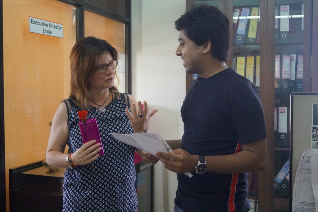 General Director, Ms. Alexandra Haglund, Mumbai Smiles felicitating Chiranshu (Volunteer) with a Certificate