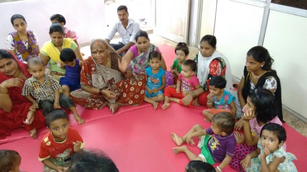 Elderly woman from community praising Mumbai Smiles for its quality services